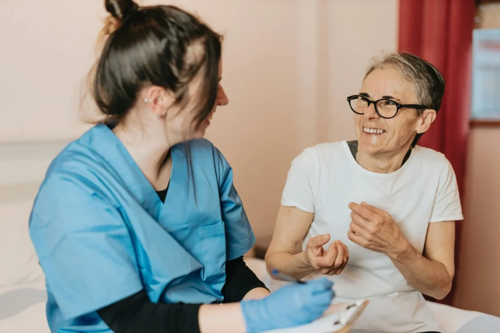 nurse talking to patient